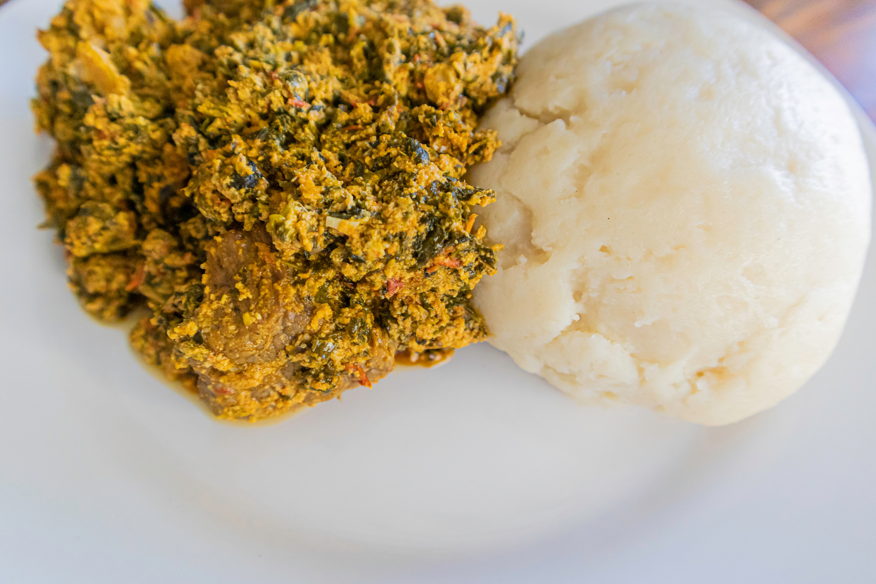 Nigerian Egusi Soup served with Pounded yam