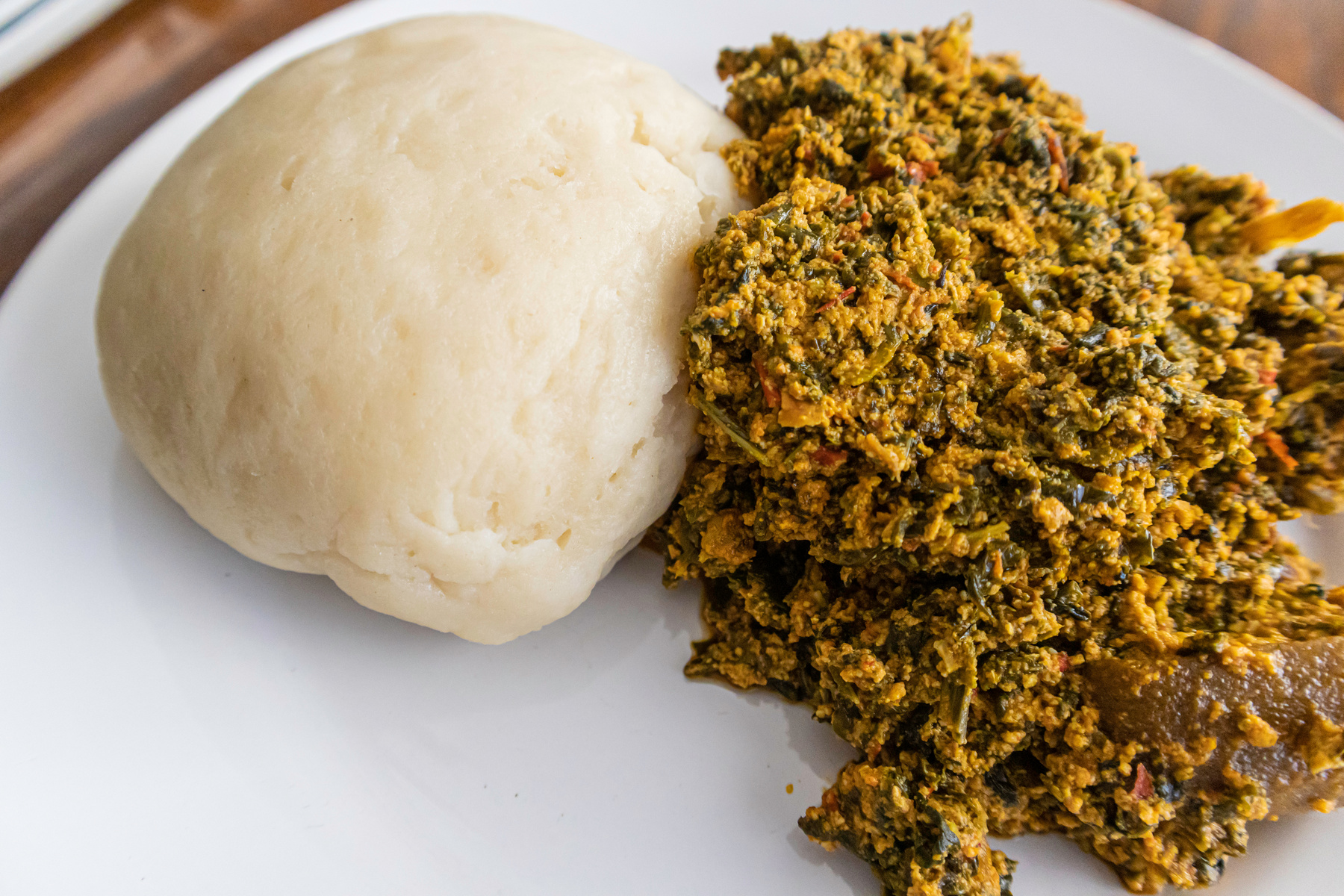 Nigerian Egusi Soup served with Pounded yam